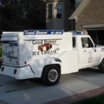 Vintage Good Humor ice cream truck parked in a driveway.